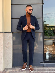 ABITO MONOPETTO IN VELLUTO CON TASCA A TOPPA