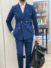 ABITO DOPPIO PETTO BOTTONE ORO